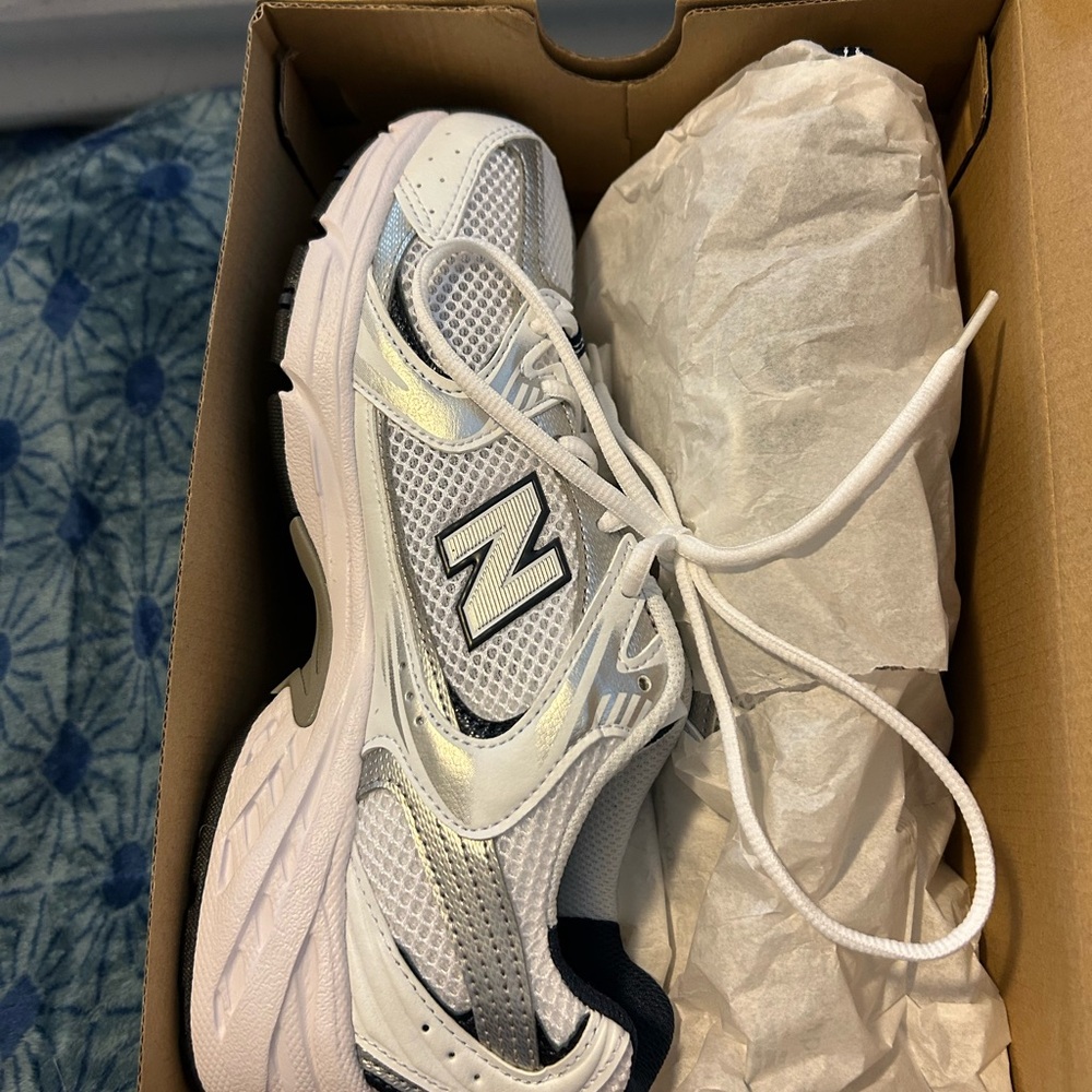 New Balance White and Silver Sneakers